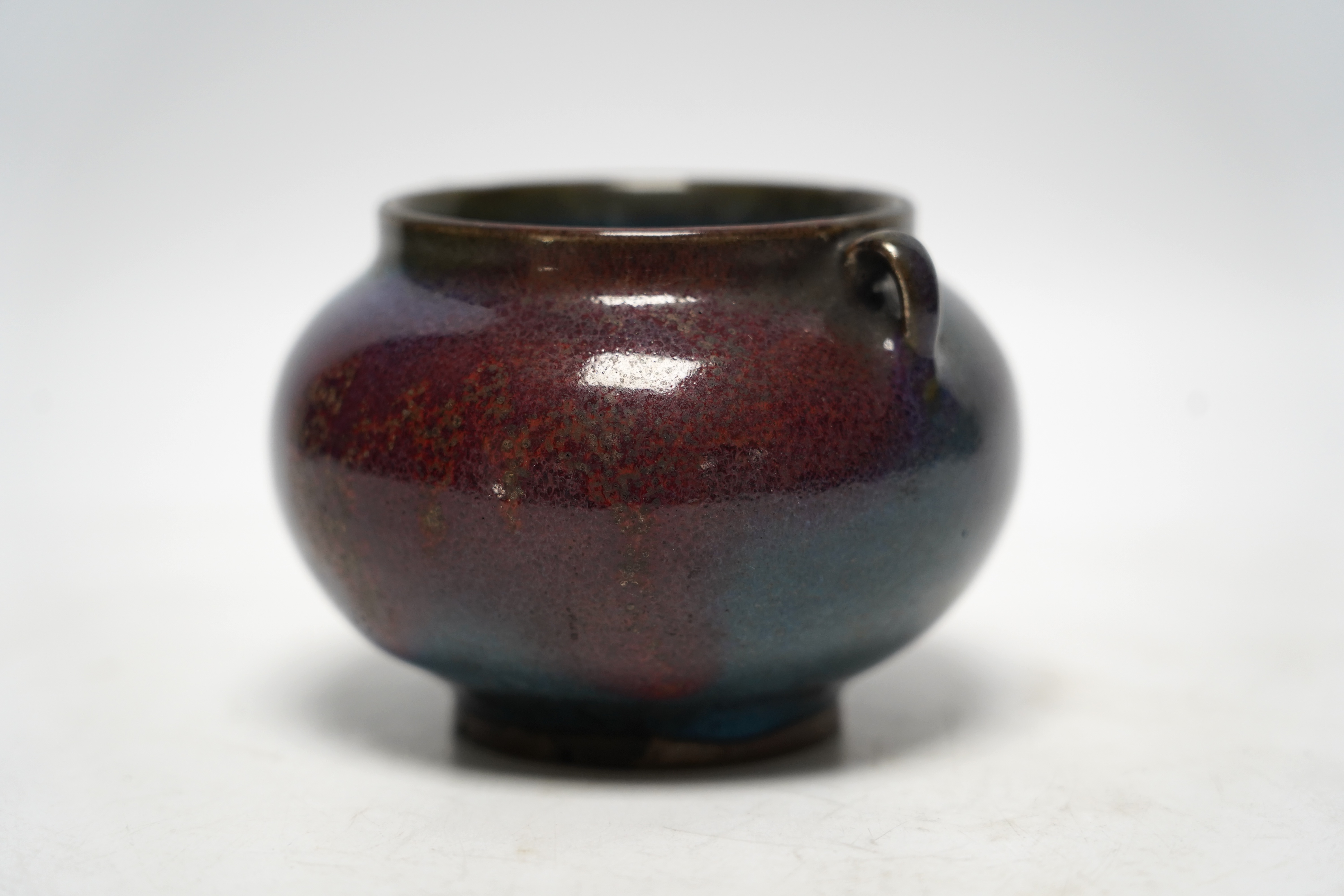 A Chinese Ming-style crimson glazed pot, 8cm high
